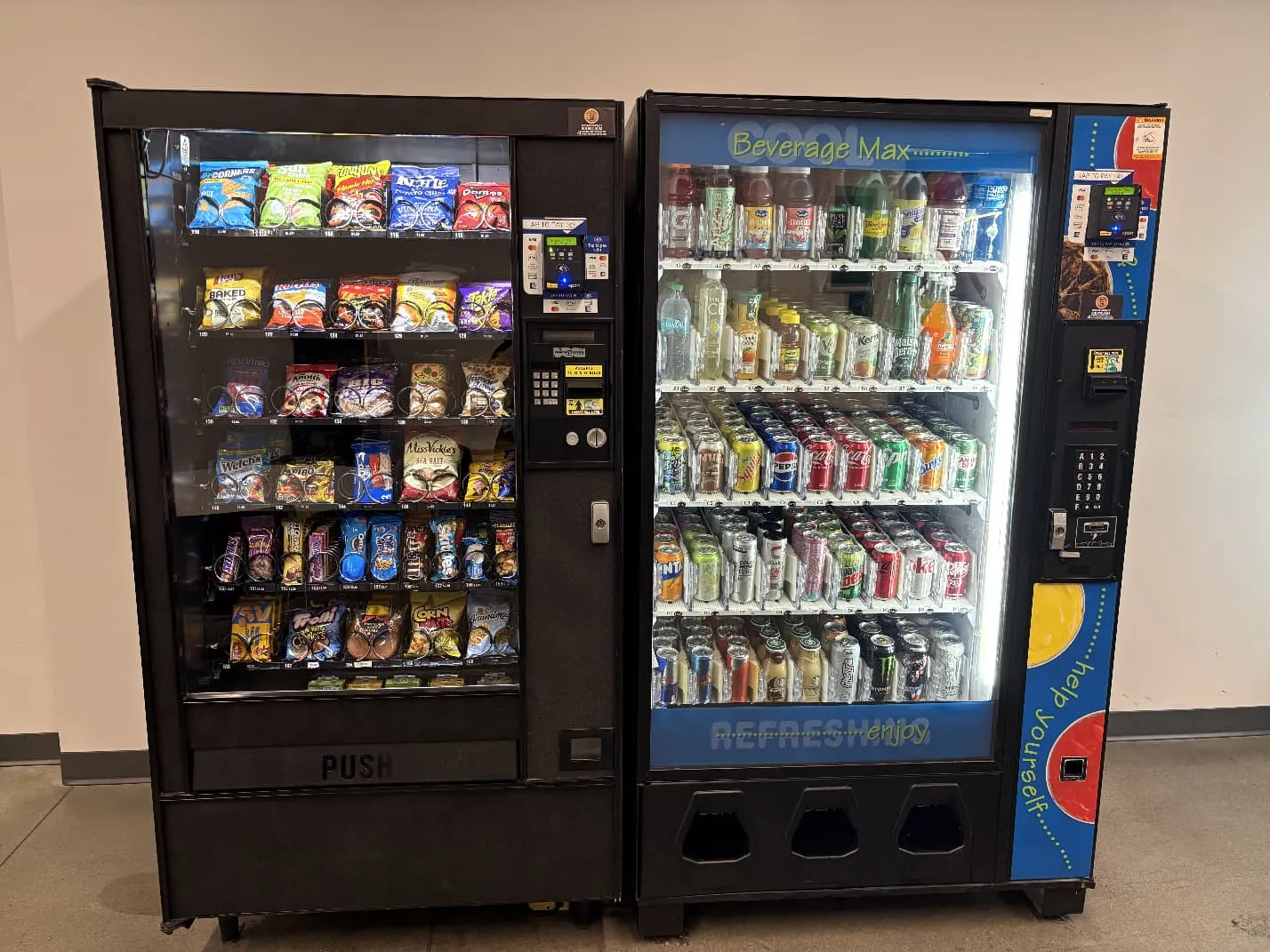 Snack vending machine and beverage vending machine installed side by side at a customer facility Snack vending machine and beverage vending machine installed side by side at a customer facility