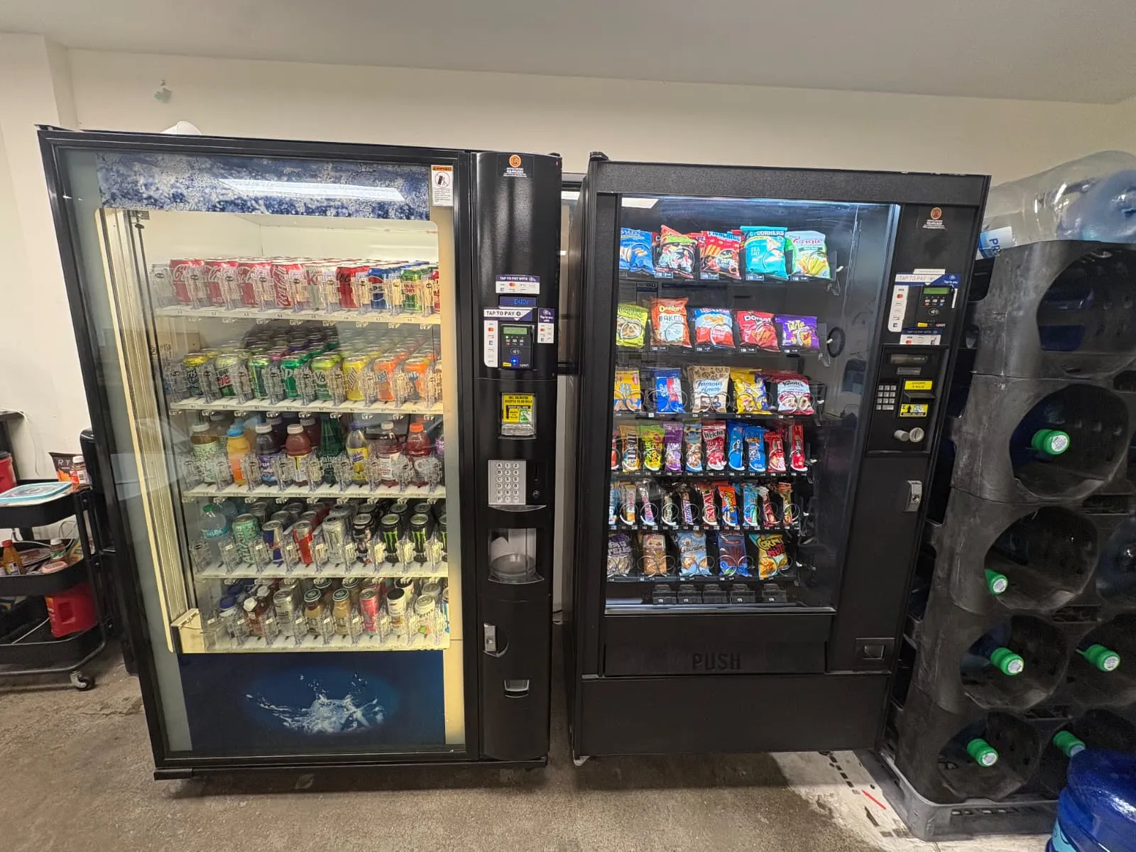 Drink and snack vending machines with cashless payment installed at a distribution facility