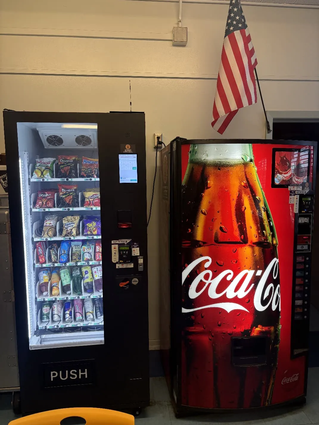 Touchscreen snack vending machine and Coca-Cola beverage machine installed at a school facility